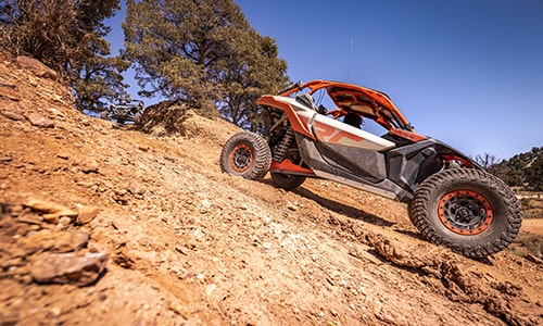 Can-Am coming down a steep trail